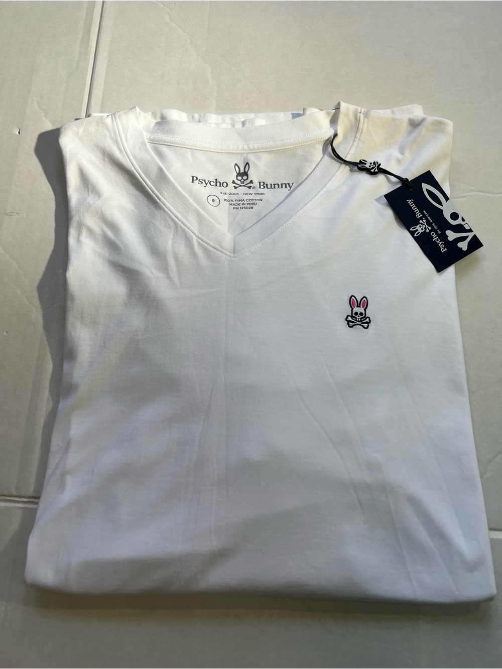 Psycho Bunny Men's White V-Neck Tee with Pink-Accented Bunny Logo